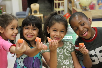 Children in Lenox Hill Neighborhood Hood House’s Early Childhood Center enjoying a Healthy Foods and Wellness presentation.